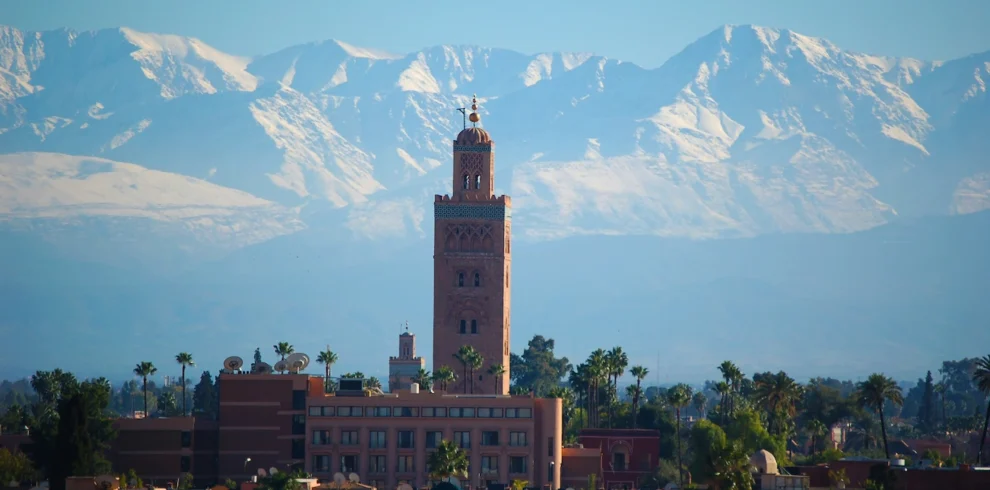 The Koutoubia Mosque minaret towering over the Marrakech skyline.